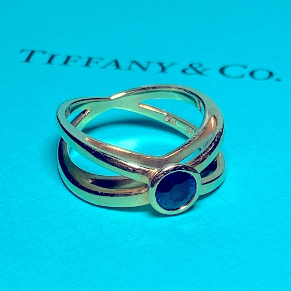 Tiffany & Co. Blue Sapphire and 18k yellow gold ring.